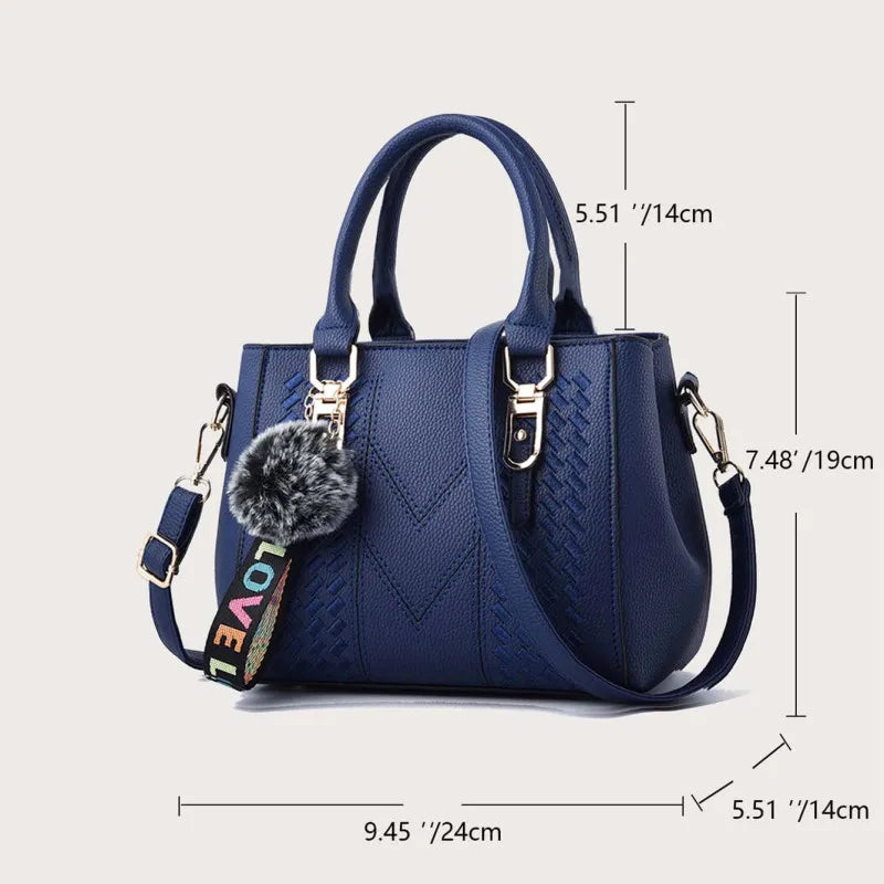 Premium Leather Messenger Bag – Intricate Floral Embroidery & Trendy Hairball Detail for Ladies
