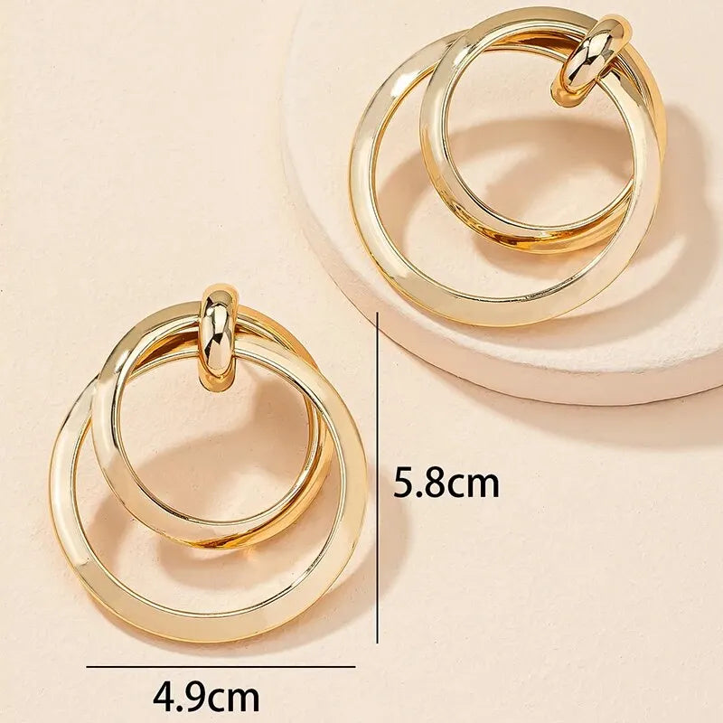 Luxe Twisted Hoop Earrings – The Perfect Day-to-Night Statement Piece